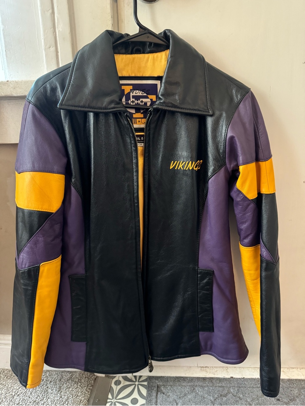Wilson Black Leather Jacket with Purple and Gold Lining Minnesota Vikings